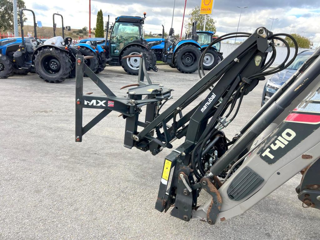 Garra/Elevador MX para fardos redondos cheio