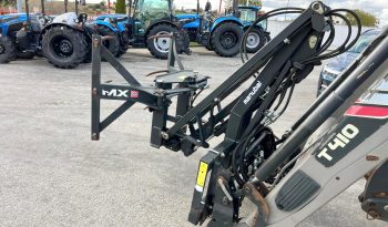 Garra/Elevador MX para fardos redondos cheio