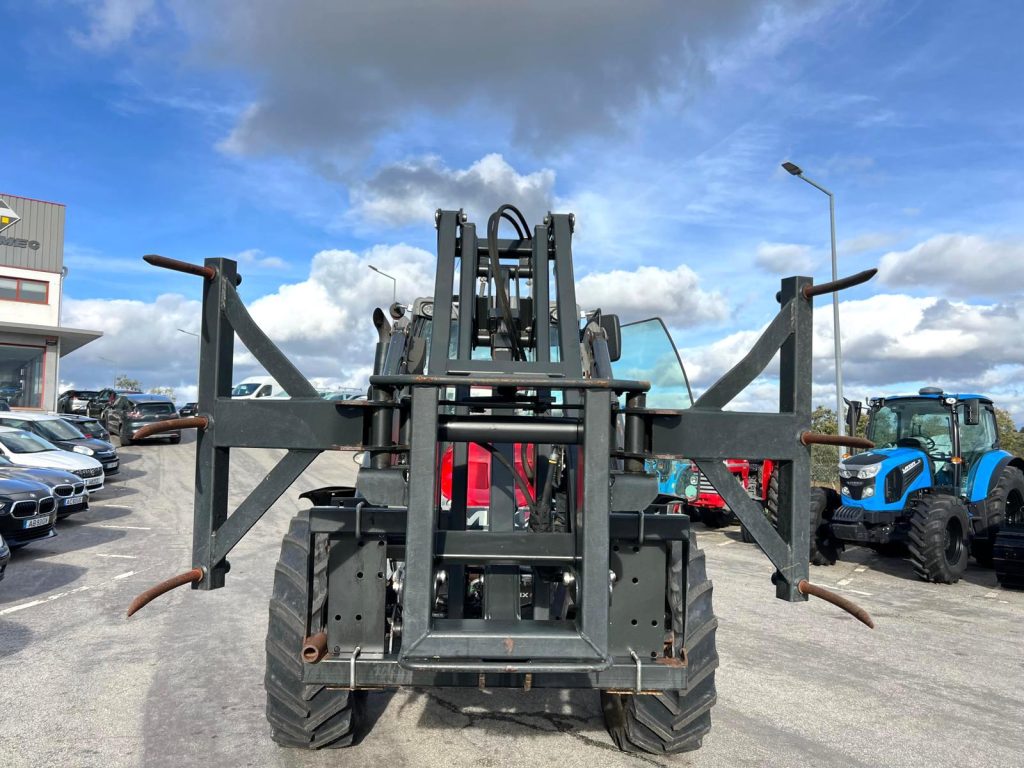 Garra/Elevador MX para fardos redondos cheio