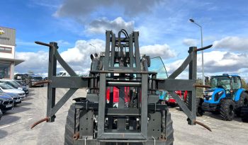 Garra/Elevador MX para fardos redondos cheio