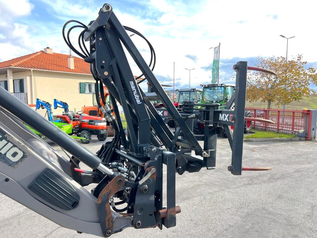 Garra/Elevador MX para fardos redondos cheio