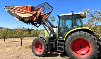 Claas Ares 566 RZ C/ Vibrador Agromelca Z20 cheio