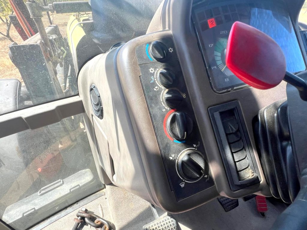 Claas Ares 566 RZ C/ Vibrador Agromelca Z20 cheio