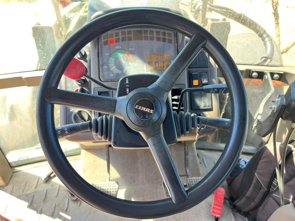 Claas Ares 566 RZ C/ Vibrador Agromelca Z20 cheio