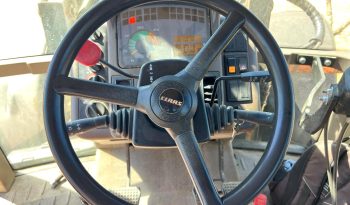 Claas Ares 566 RZ C/ Vibrador Agromelca Z20 cheio